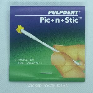 A picture of the back side of a box of tooth picks.