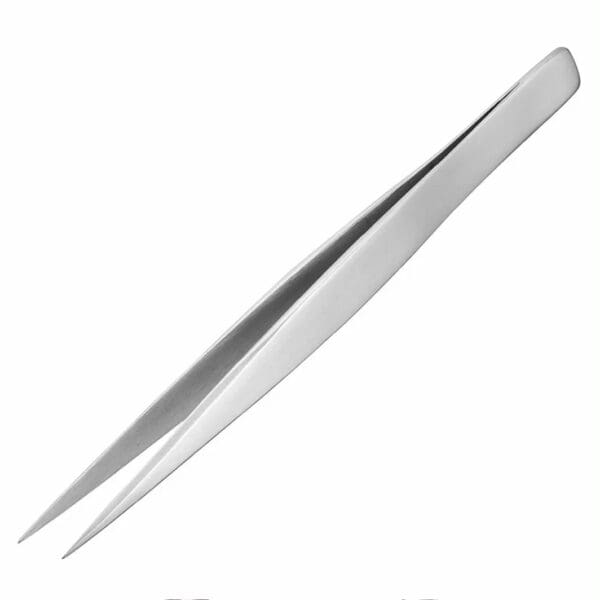 A close up of a metal tweezer on a white background