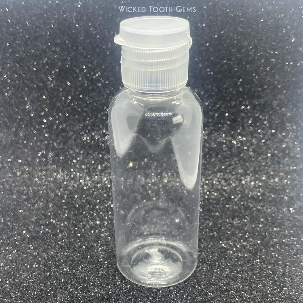 A bottle of water sitting on top of a table.