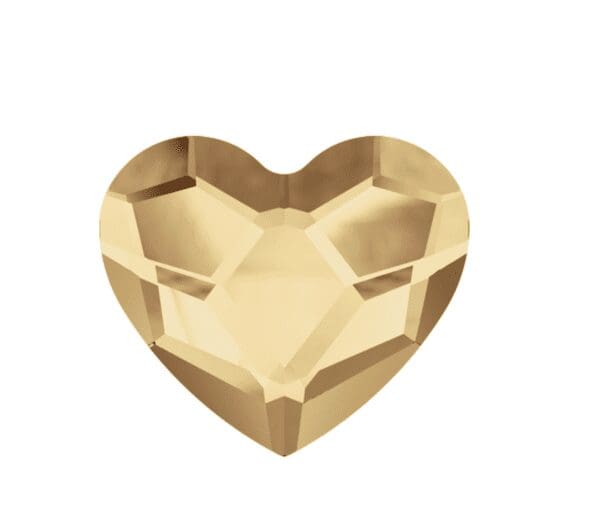 A heart shaped diamond is shown in gold.