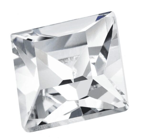 A square shaped diamond is sitting on top of the floor.