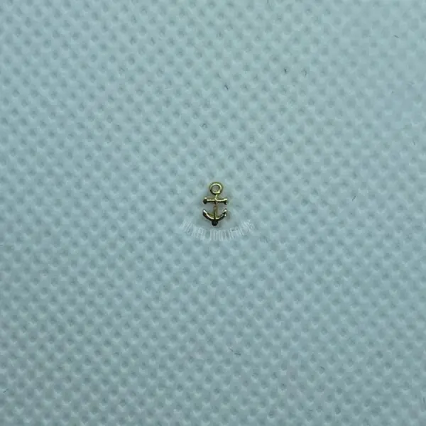 A small white bug sitting on top of a blue surface.