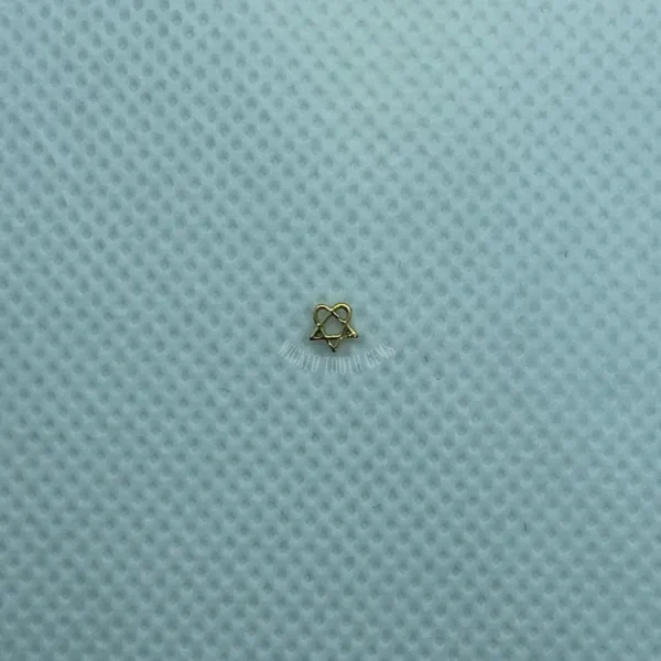 A small piece of cloth sitting on top of a blue surface.