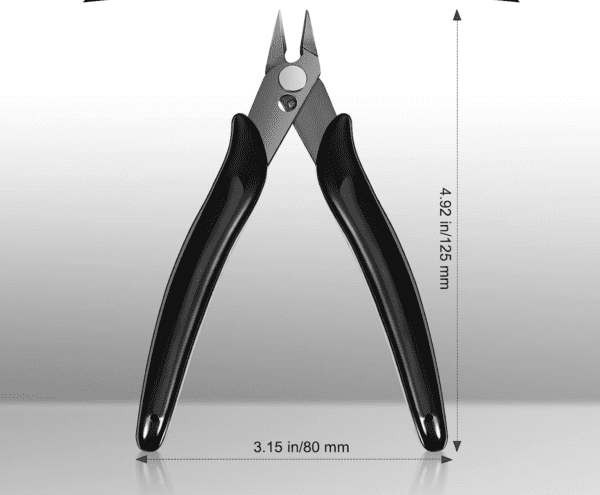 A pair of pliers with measurements on top.