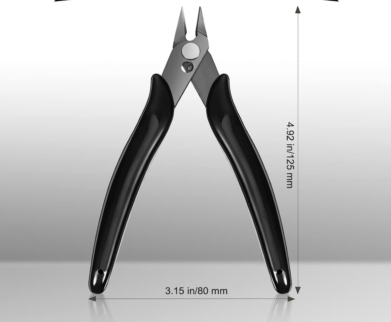 A pair of pliers with measurements on top.