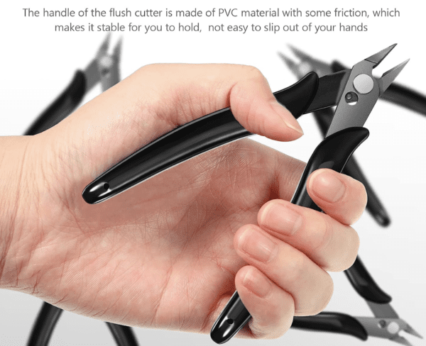 A person holding a pair of black scissors.