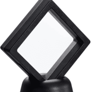 A black square shaped object on top of a stand.